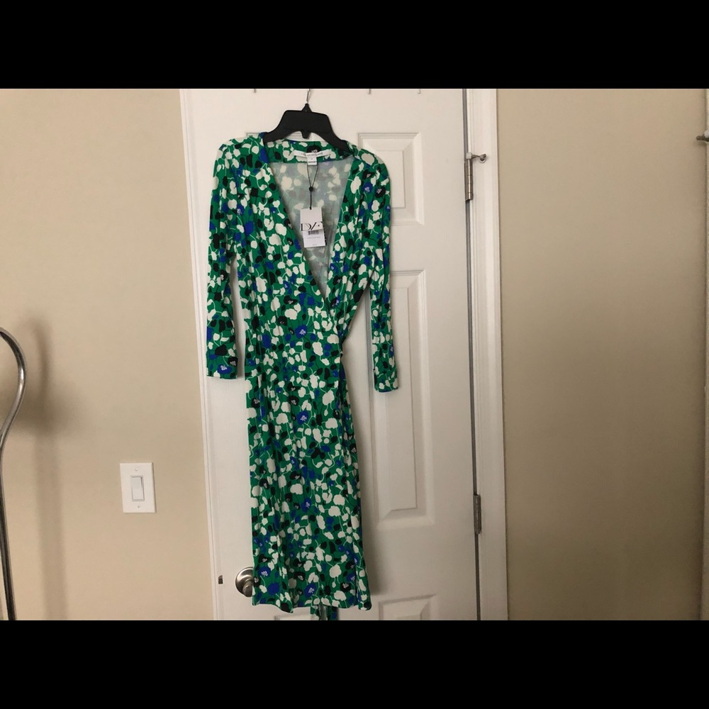 Brand new designer dress! Gorgeous green flower.
